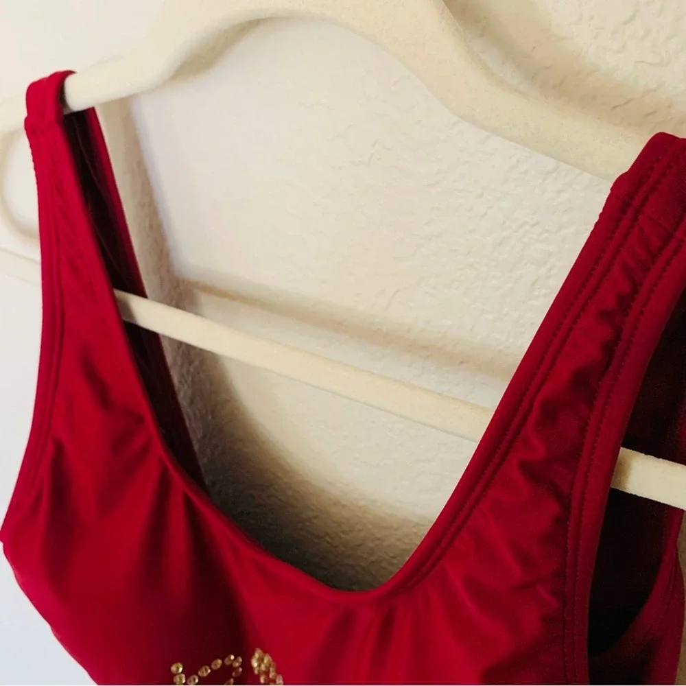 bebe | NWT size medium Burgandy low back one piece swimsuit with rhinestones